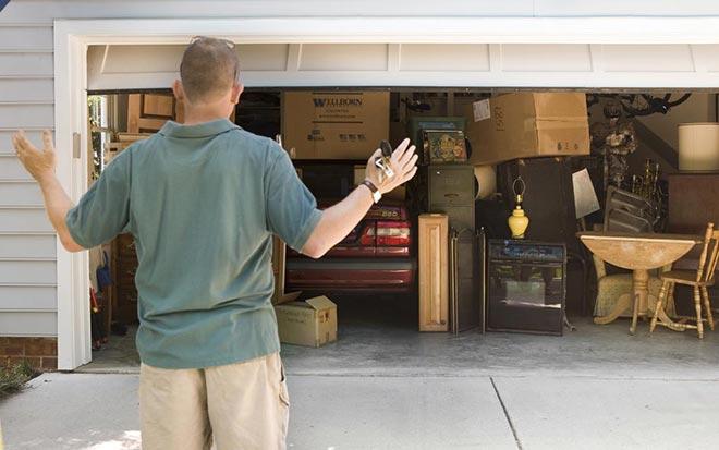 dad stressed over cluttered garage