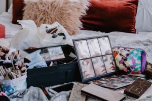 Going through makeup to determine what to keep, what to store, and what to toss when decluttering.